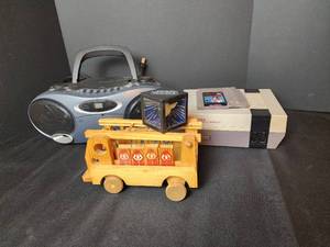 lot 484 image: Nintendo Game System (no cords - untested), Game, Memorex AMFMCD Stereo, and Vintage Wooden Fire Truck Toy