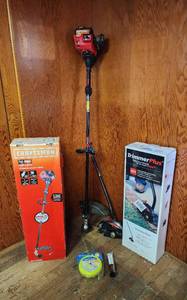 lot 53 image: Craftsman Handheld Trimmer, Trimmer Plus Lawn Edger Attachment, and String