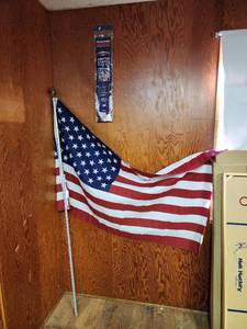 lot 54 image: Flagpole with Flag and Flag Mount