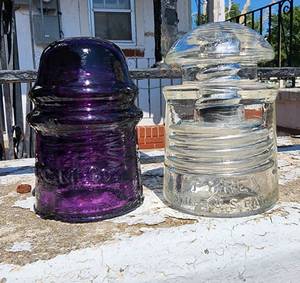 lot 608 image: Purple W.G.M. Co. Insulator and Clear Pyrex Insulator