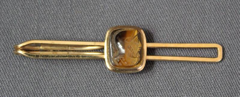 lot 4015 image: Gold and Carved Wood Roman Money Clip 120 12KT G.F.