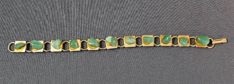 lot 4018 image: Gold tone Bracelet with Green Stones