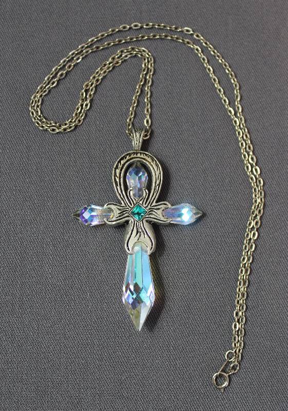 lot 4019 image: Gorgeous Crystal Cross Necklace w Blue stone Marked 7693 on back