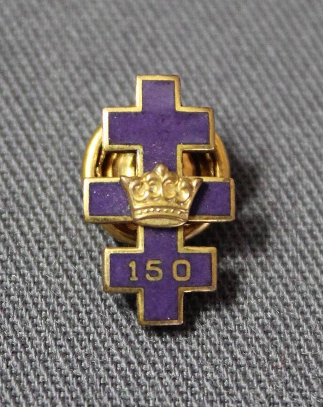lot 4037 image: Small Purple Lapel Pin with Crown Design and says 150 Back Roulet Co. Toledo, O
