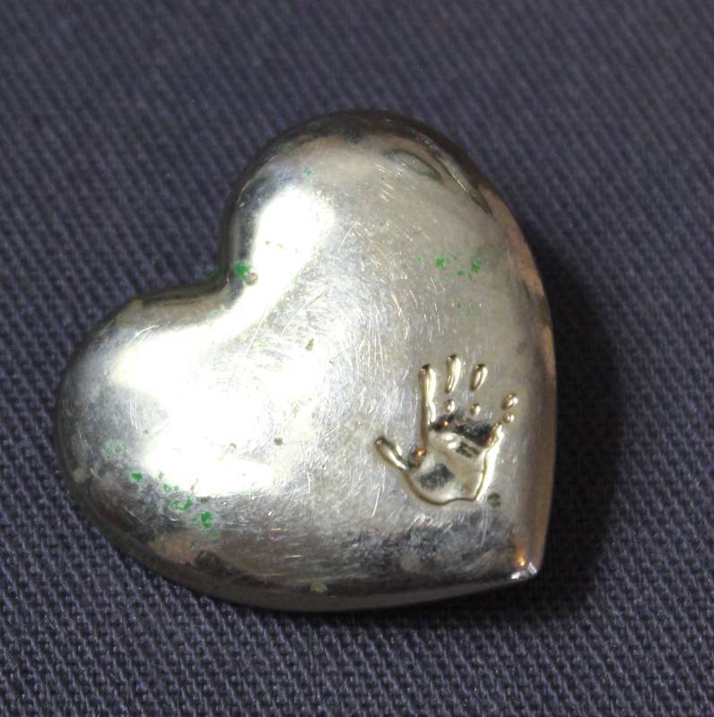 lot 4039 image: Heart Lapel Pin with Tiny Hand Imprint Marked The Variety Club on Back