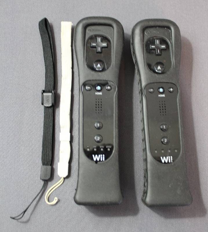 lot 4069 image: Two Black Nintendo Wii Controllers w Gel Case and Extended Battery