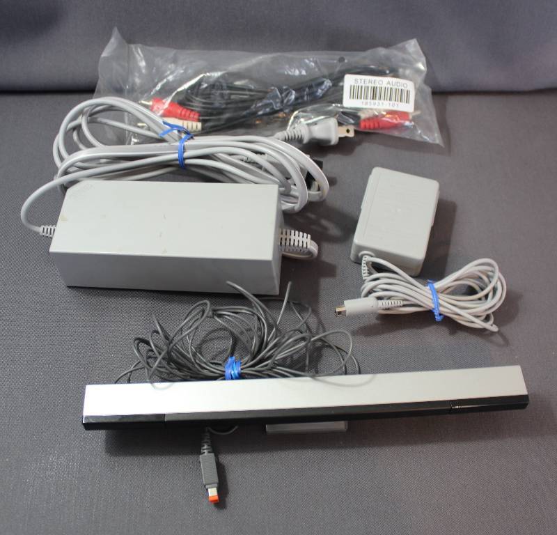 lot 4070 image: Nintendo Wii Sensor Bar, AC Adaptor, and Stereo Audio Cable