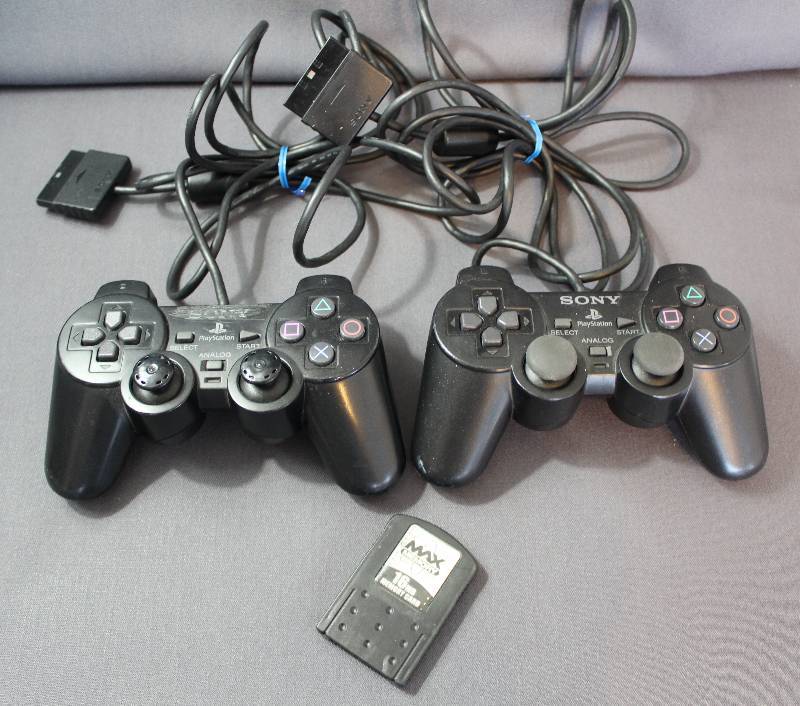 lot 4072 image: Playstation Analog Dual Shock Controllers w 16GB Memory Card