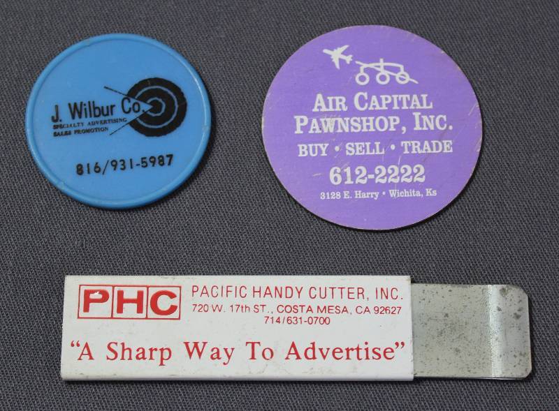 lot 4130 image: Advertisement LOT includes Chip, Magnet, and Box Cutter