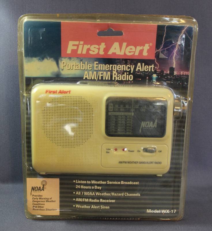 lot 4135 image: First Alert Portable Emergency Alert AMFM Radio Model WX-17