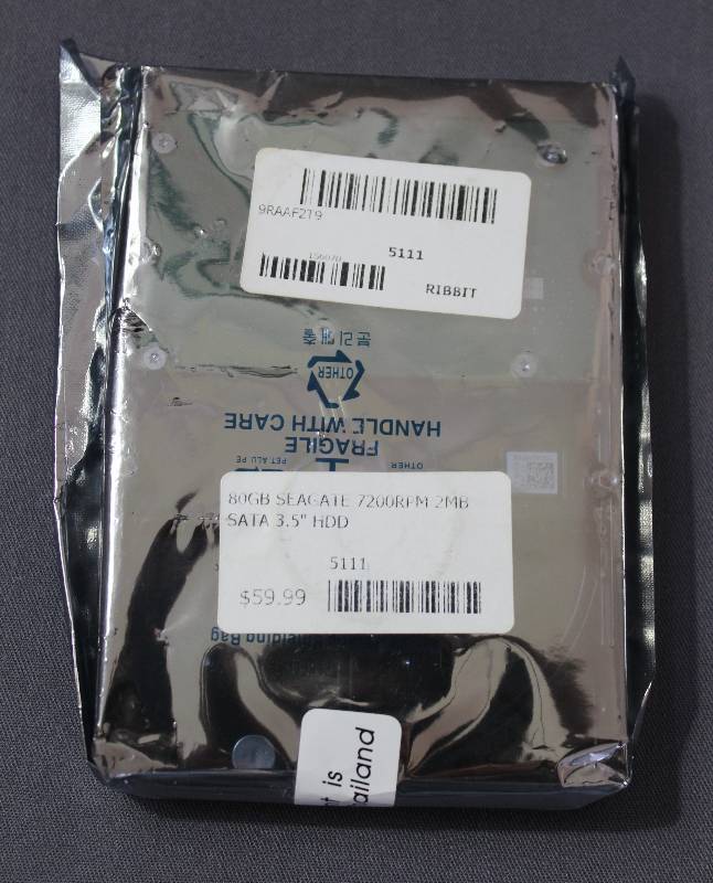 lot 4140 image: Computer 80GB Seagate 7200RPM 2MB SATA 3.5 HDD 5111