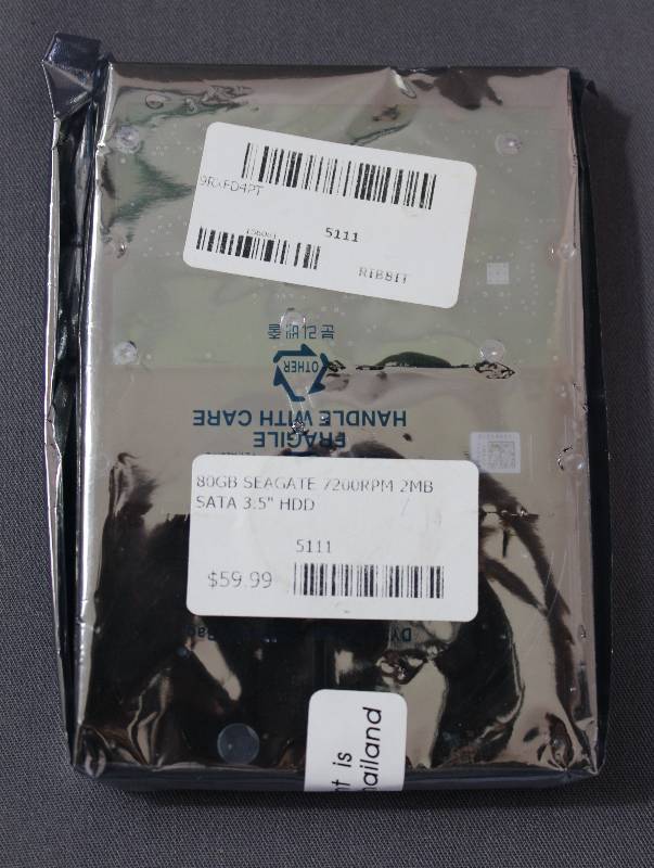 lot 4141 image: Computer 80GB Seagate 7200RPM 2MB SATA 3.5 HDD 5111