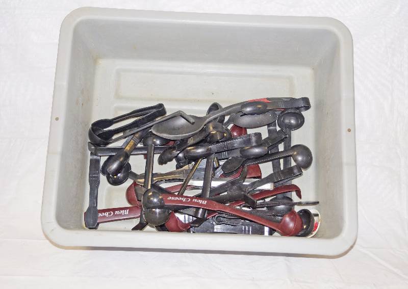 lot 5334 image: Gray Bus Tub w lots of tongs, ladles and spoons for serving  cooking