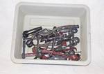 Gray Bus Tub w/ lots of tongs, ladles and spoons for serving / cooking