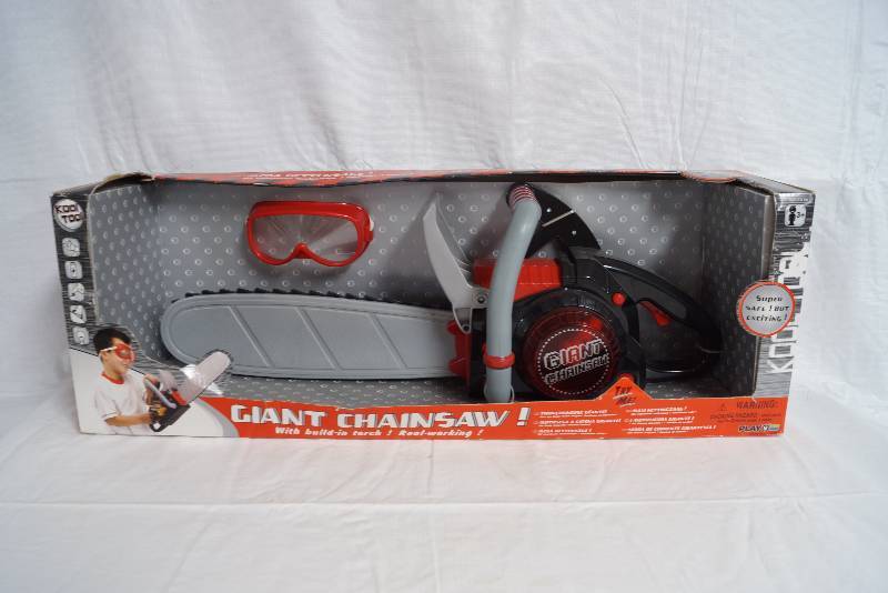 lot 1066 image: Giant Chainsaw Toy w goggles New in Box