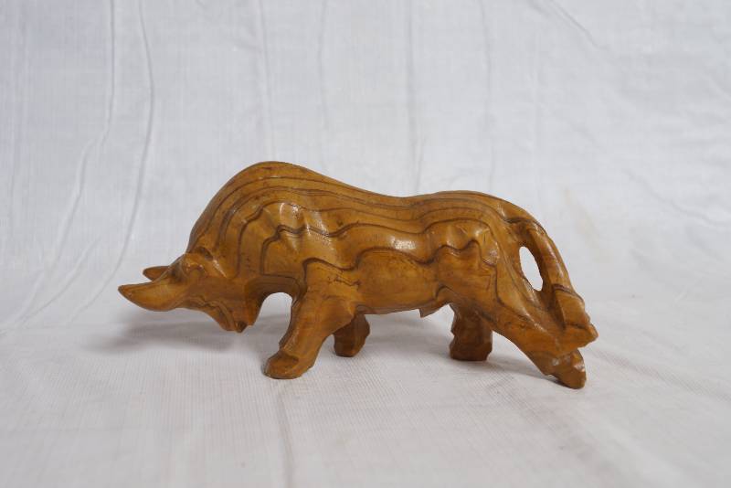 lot 1016 image: Wooden Charging Bull Figurine