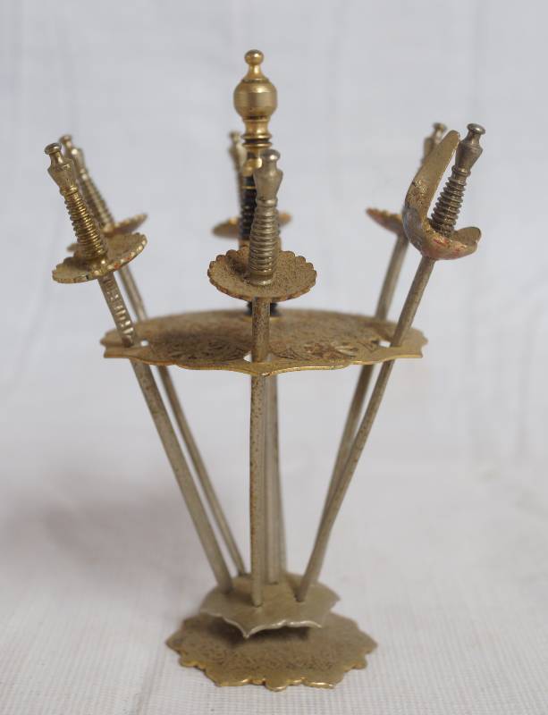 lot 1124 image: Miniature TOLEDO Swords w stand - WOW Collectible