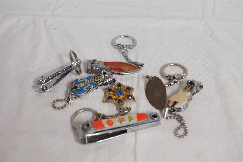 lot 2418 image: Lot of Keychains  Fingernail Clippers and More