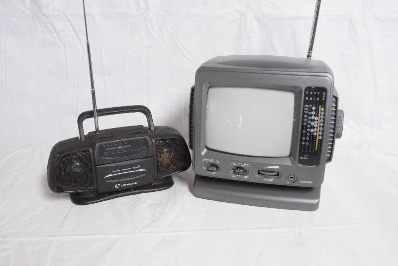 lot 99300 image: Small TV and Jam Box Lot