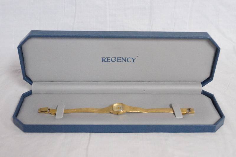 lot 9329 image: Ladies Regency Gold Tone Wrist Watch