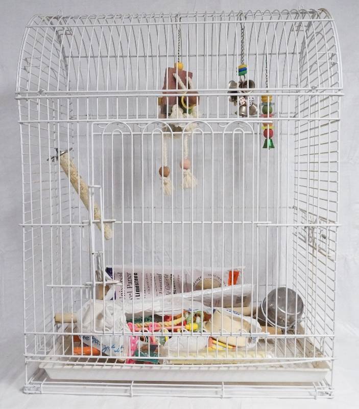 lot 9341 image: 31 Inch Tall White Wire Bird Cage- Bag of Bird Toys and Accessories Included