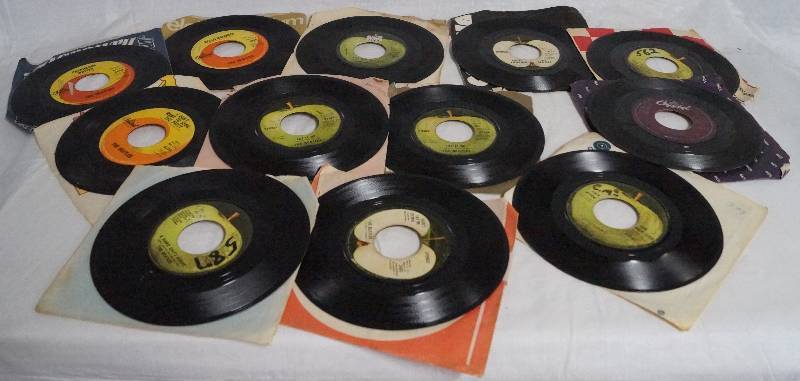 lot 9357 image: Lot of 12 Beatles Vinyl 45 Records- VERY Cool Find See Photos for Song Titles