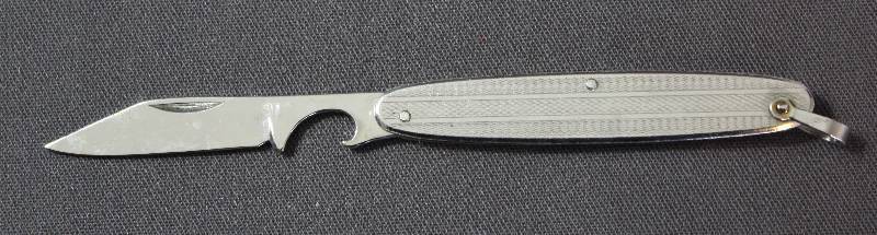 lot 9045 image: 3 Folding Pocket Knife with Key Ring. Beautiful Embossed Design