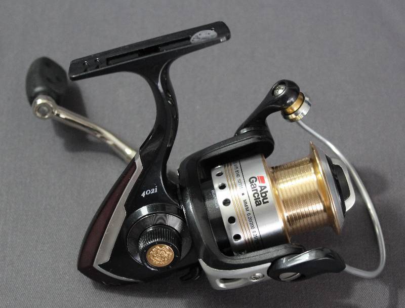 lot 9136 image: NEW Abu Garcia Cardinal 402i Spinning Fishing Reel - 8-Bearing. Gear Ratio 5.11