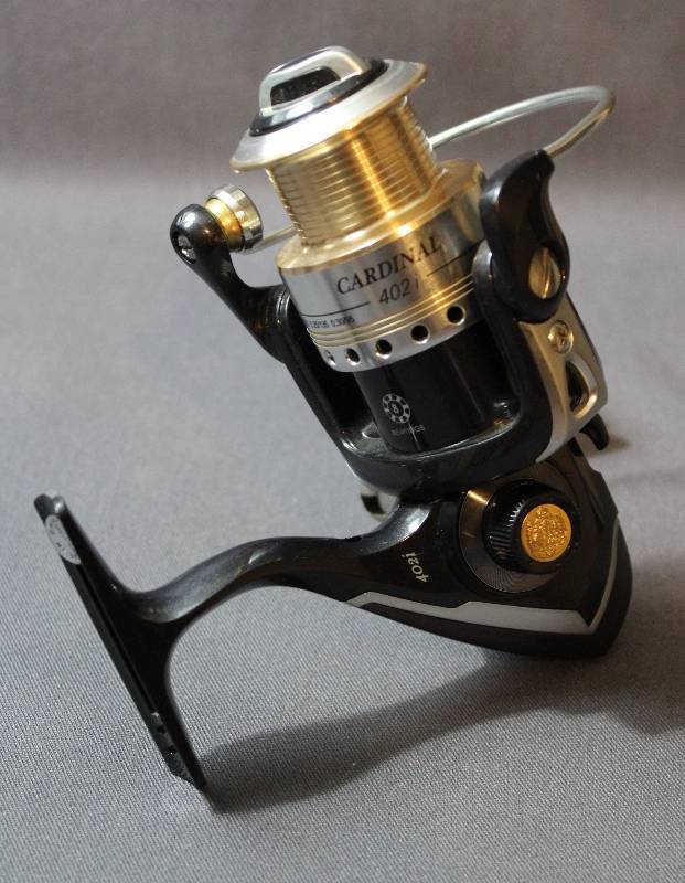 lot 9139 image: NEW Abu Garcia Cardinal 402i Spinning Fishing Reel - 8-Bearing. Gear Ratio 5.11