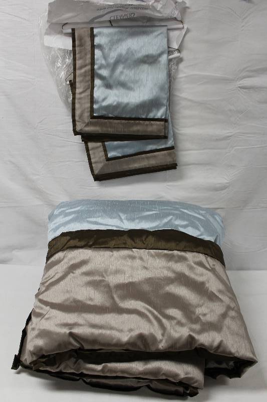 lot 9194 image: Twin Size Blue and Brown Comforter and Standard Size Pillow Shams.