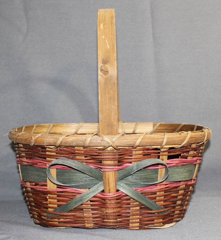 lot 9447 image: Beautiful Wicker Basket with Green Ribbon, 12h x 11w