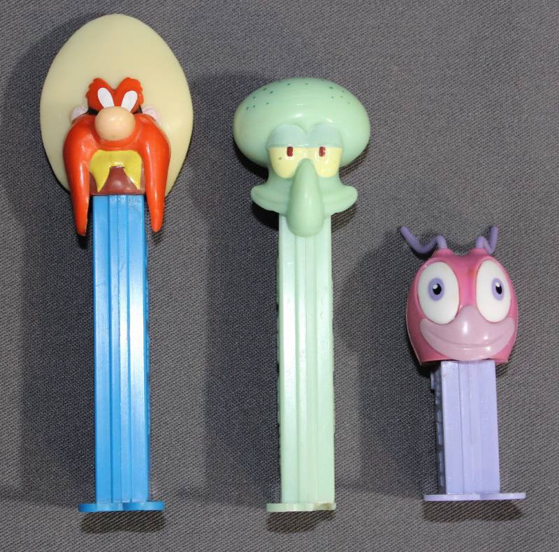 lot 9450 image: 3 PEZ Dispensers - Yosemite Sam, 2004 Squidward Tentacles, & Alien