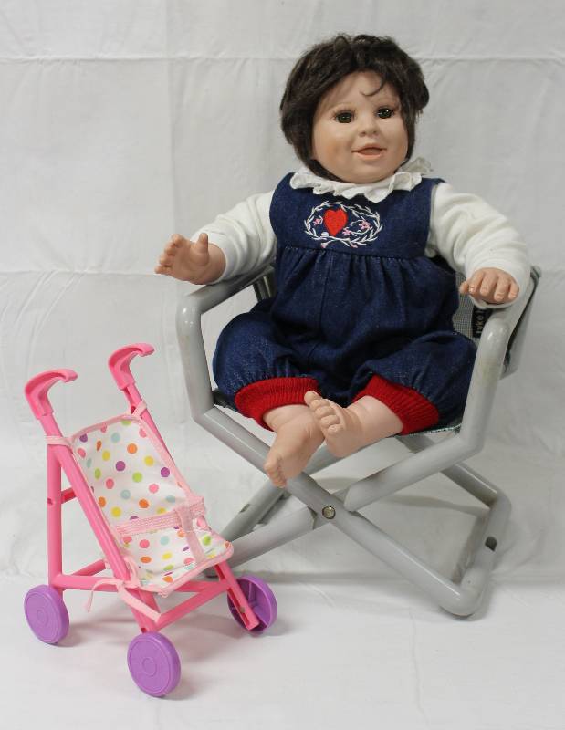 lot 9233 image: Heritage Doll, 11 Tike Hike Seat, and 9.5 Stroller.