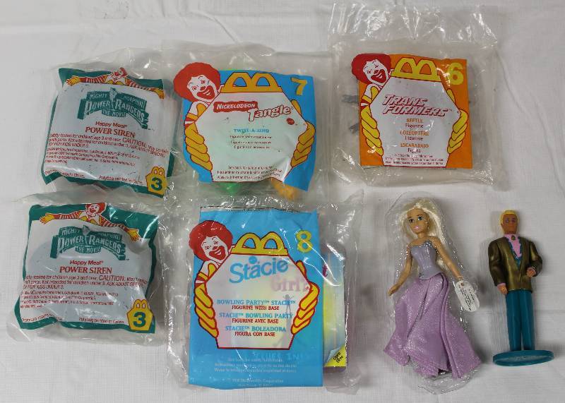 lot 9247 image: Lot of 7 McDonalds Happy Meal Toys - Barbie, Transformers, and More.