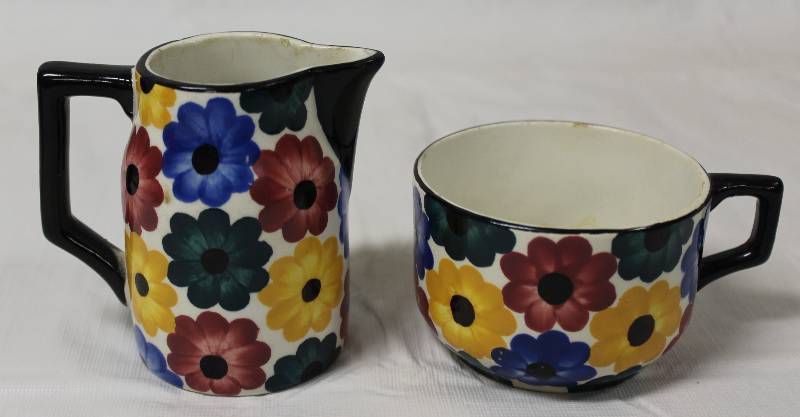 lot 9249 image: Vintage Ges. Gesch. Germany Tea cup #42 and Creamer Pitcher #77.