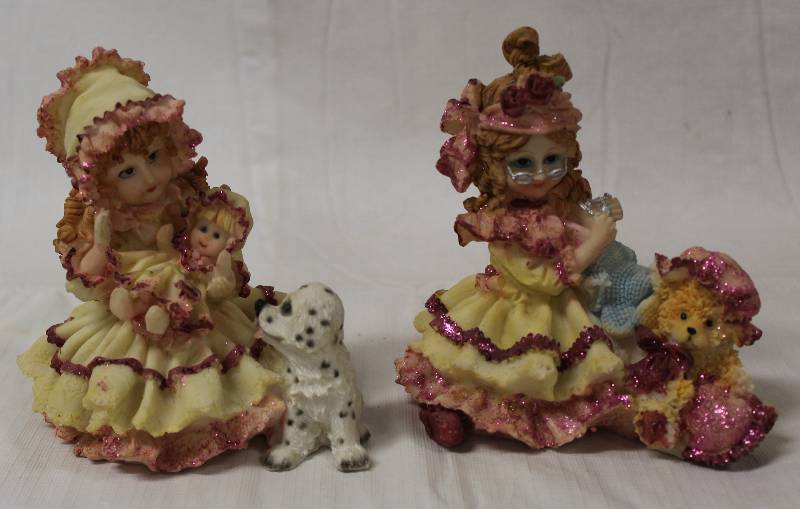 lot 9327 image: Two Girl Figurines with Dalmatian and Stuff Animal, about 6 tall
