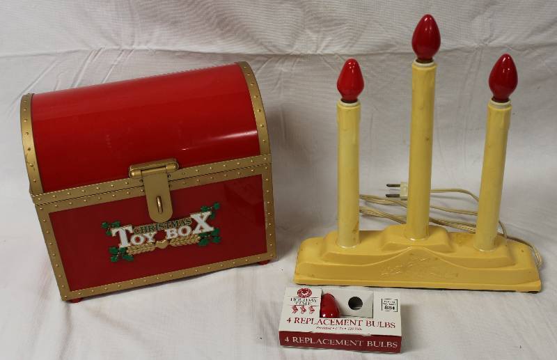 lot 9343 image: Christmas Electronic Decorations - Toy Box & Candles.