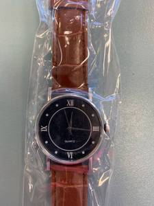 lot 1518 image: Black and brown fashion watch