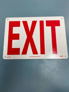 lot 1536 image: Plastic exit sign -Glows in the dark