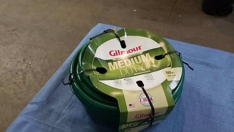 lot 1012 image: New Water Hose- Medium Duty  50ft