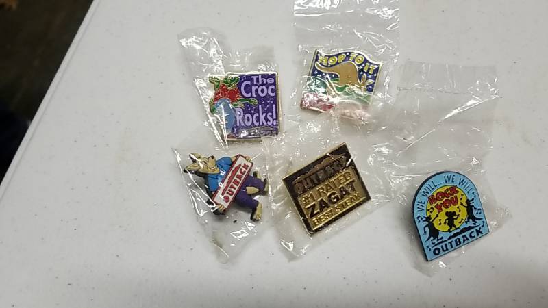 lot 3135 image: Lot of 5 Collectors Pins- Outback Steakhouse- Appear NEW