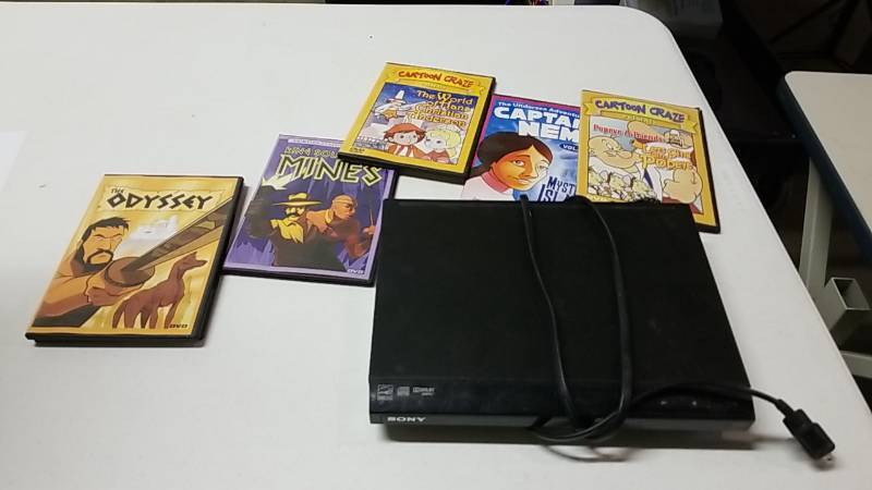 lot 3157 image: DVD Player and Kids DVDs