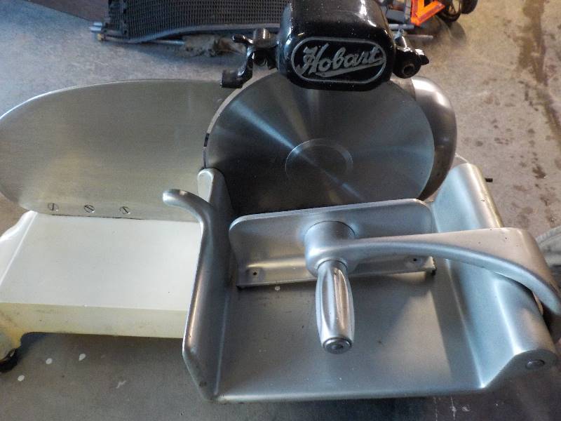 lot 3743 image: Hobart Comercial Meat Slicer with 10 blade and built in blade sharpener (WORKS)