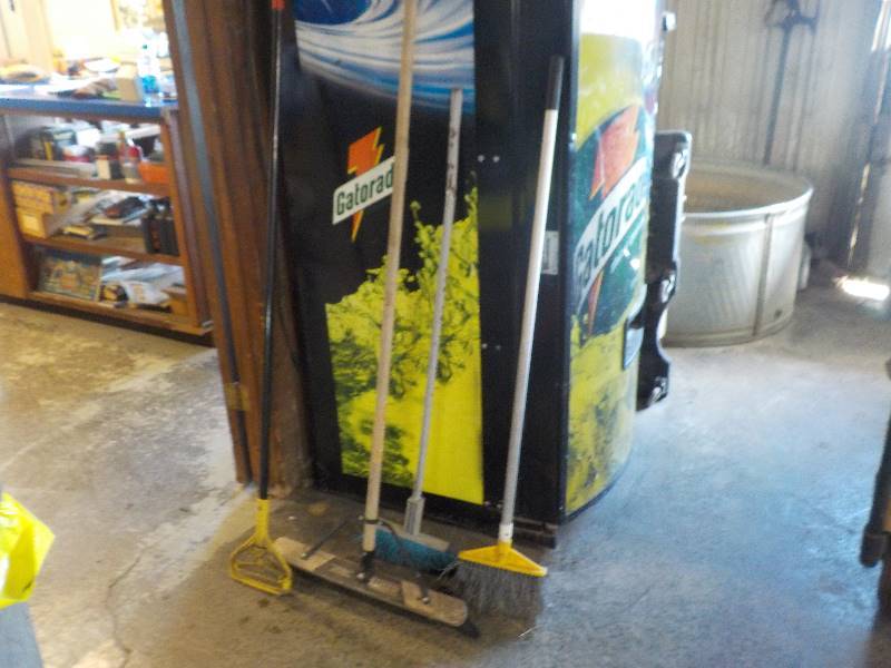 lot 3770 image: 3 brooms and a mop handle