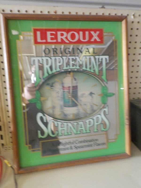 lot 3778 image: Leroux Schnapps Clock Battery operated