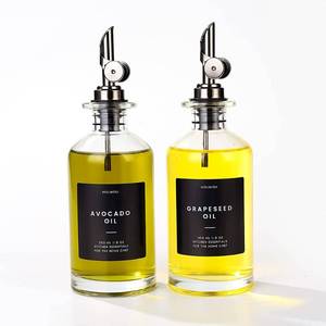 lot 84059 image: Molimoli Oil and Vinegar Dispenser with Metal Pour Spout, Weighted Pourer, Glass Bottle Dispenser for Kitchen, Olive Oil Cruet, Glass Olive Oil Bottle 350ml, Set of 2