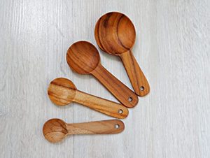 lot 86391 image: Set of 4 pieces (no marking) Teak Wooden Measuring Spoons, this rustic set made from eco friendly Teak Wood