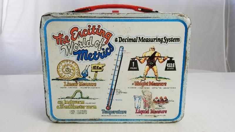 lot 3711 image: 1976 The Exciting World of Metrics Vintage Metal Lunch Box
