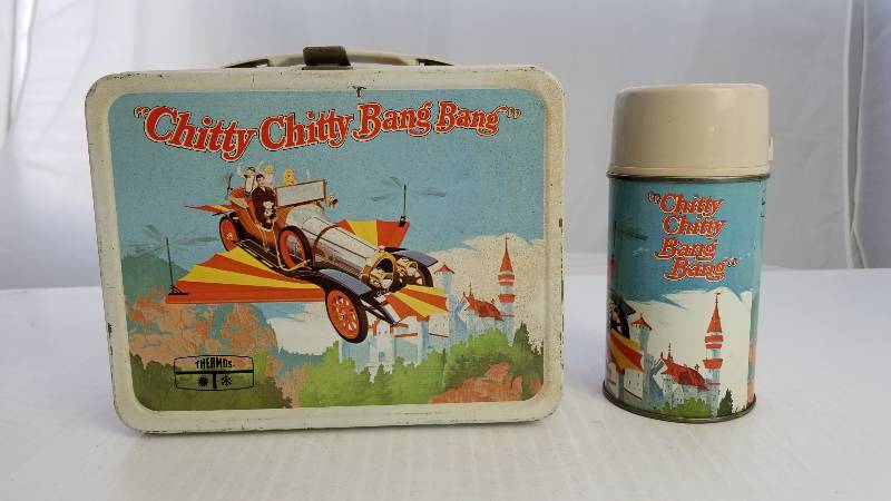 lot 3735 image: 1968 Chitty Chitty Bang Bang Half Pint Size King-Seeley Bottle w Glass Liner Vintage Metal Lunch Box