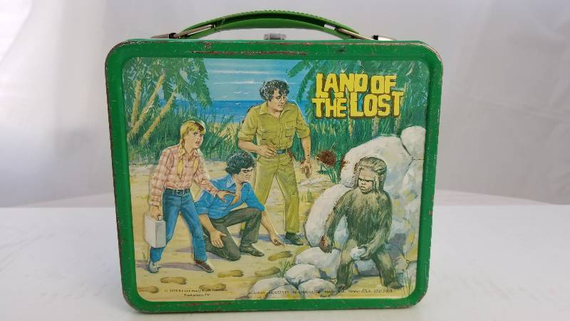 lot 3793 image: 1975 Land of the Lost Vintage Metal Lunch Box